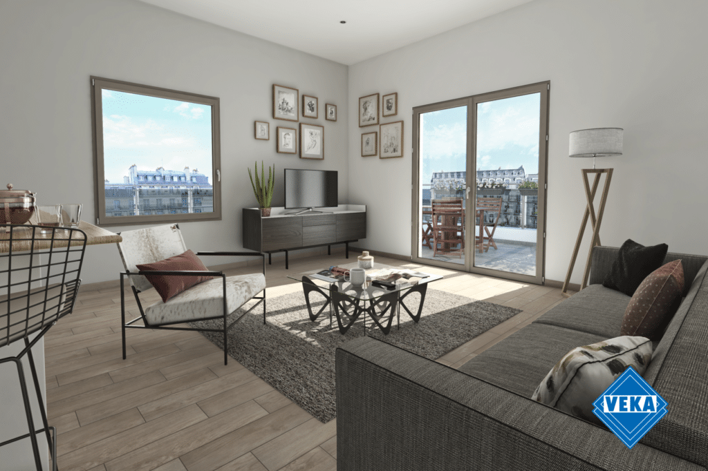 Salón moderno con grandes ventanas de Sabaya, combinando un ventanal oscilobatiente y una puerta practicable hacia la terraza.